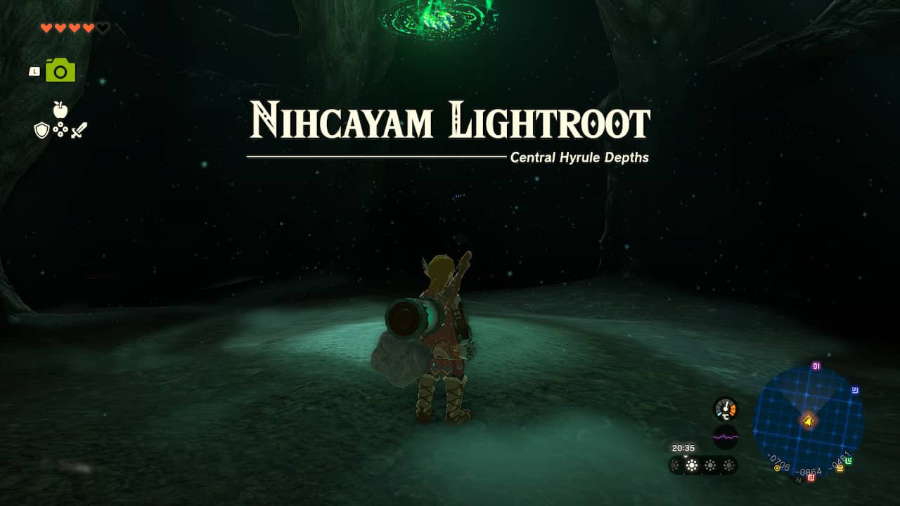 Tears of the Kingdom tips: Link standing under a Lightroot in the Depths. A message reads: "Nihcayam Lightrood: Central Hyrule Depths".