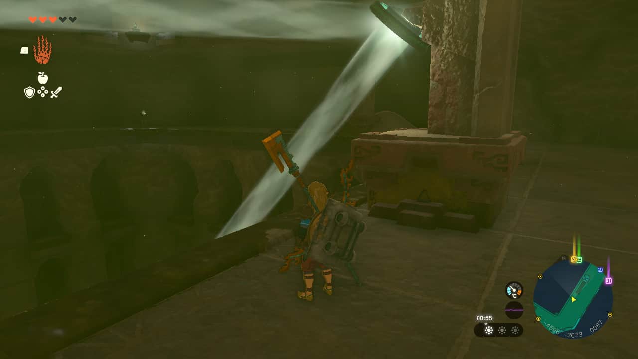 Tears of the Kingdom Lightning Temple walkthrough: Link stood next to a statue with a mirror attached, which is reflecting a beam of light downwards.