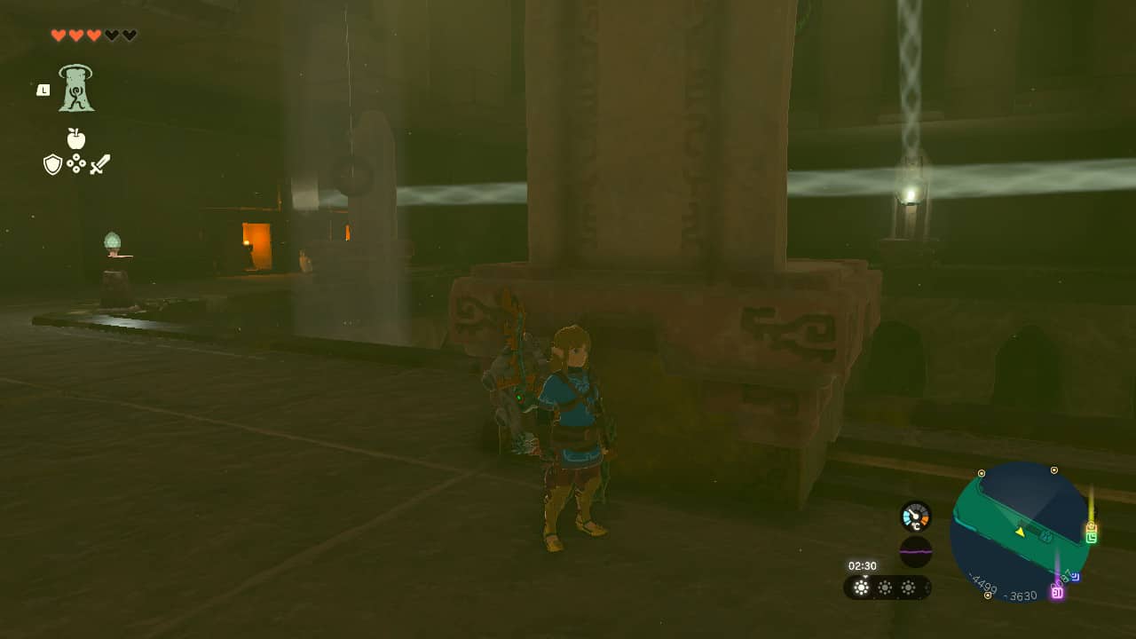 Tears of the Kingdom Lightning Temple walkthrough: Link standing behind a large stone statue. In the background, beams of light travel across the screen.