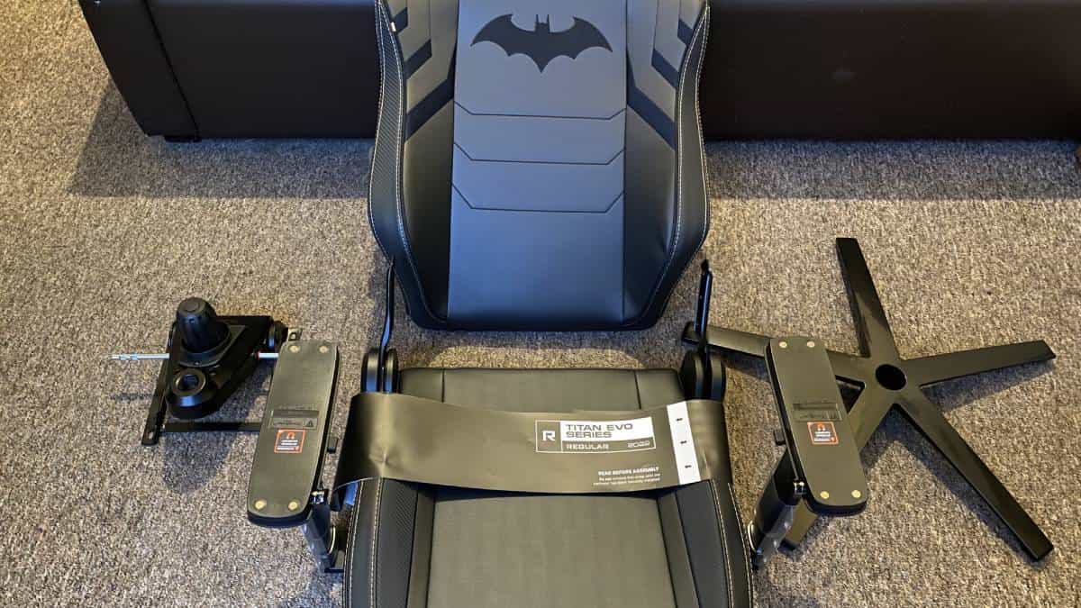 A SecretLab Titan EVO gaming chair inspired by The Dark Knight, each individial piece before assembly.