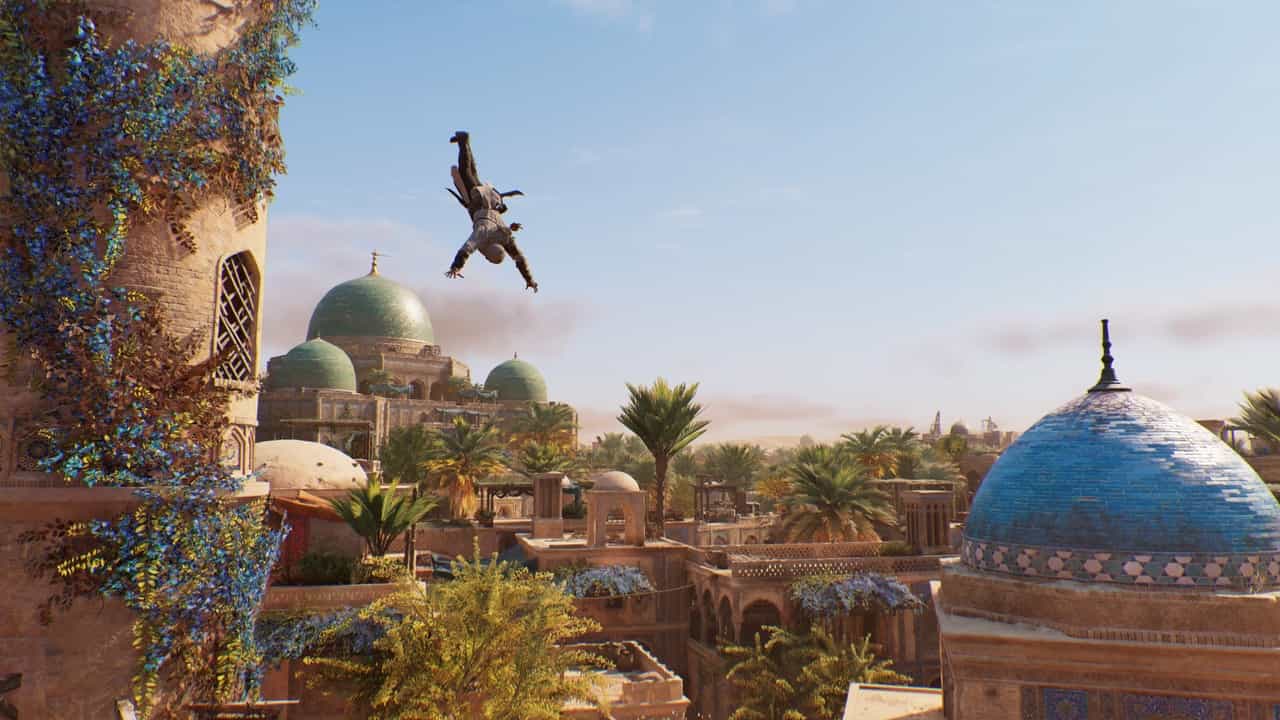 Assassin’s Creed Mirage review: Basim performing a leap of faith from a viewpoint tower.