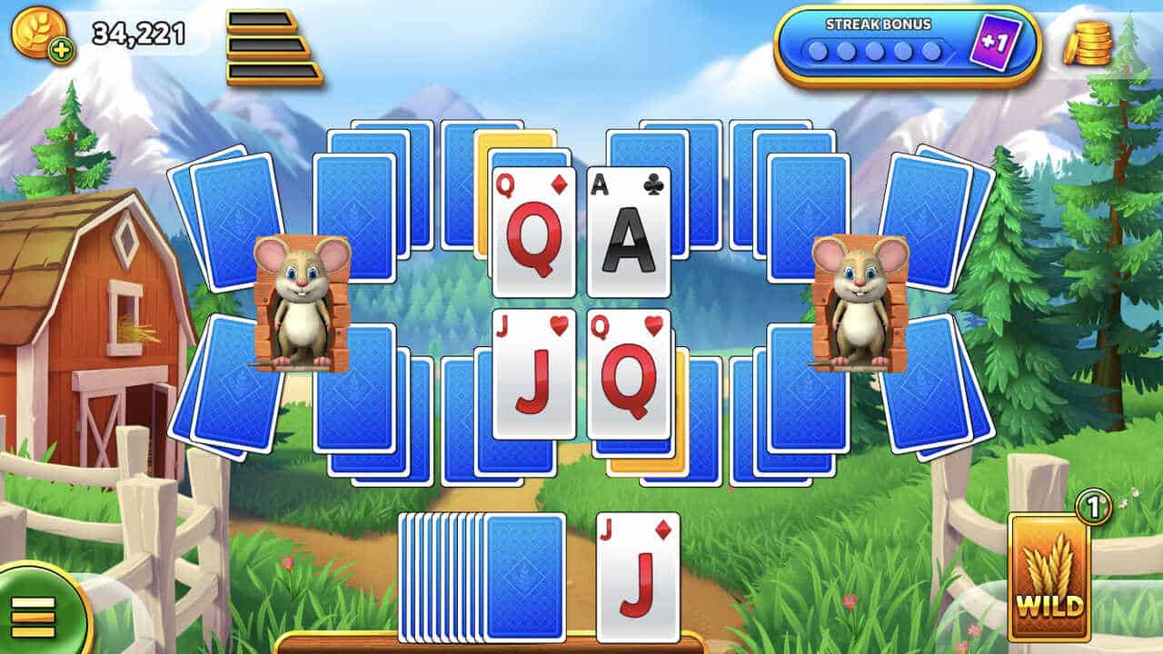 Solitaire Grand Harvest free coin links: a game of solitaire set against a farmyard background.