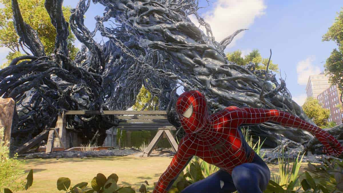 Marvel's Spider-Man 2's protagonist is standing in front of a tree.