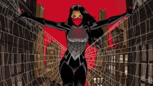 Cindy Moon, dressed in a Spider-Man costume, standing in a city.