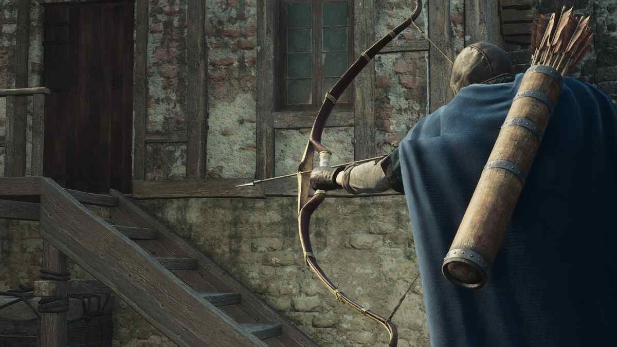 Archer preparing to shoot an arrow with one of the best bows from Dragon's Dogma 2 beside a dilapidated building.