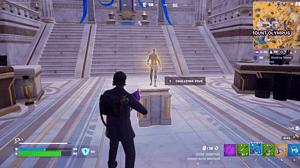 Fortnite how to get Aspect of the Gods: A player with an Alan Wake skin standing next to a small statue of Zeus in Fortnite.