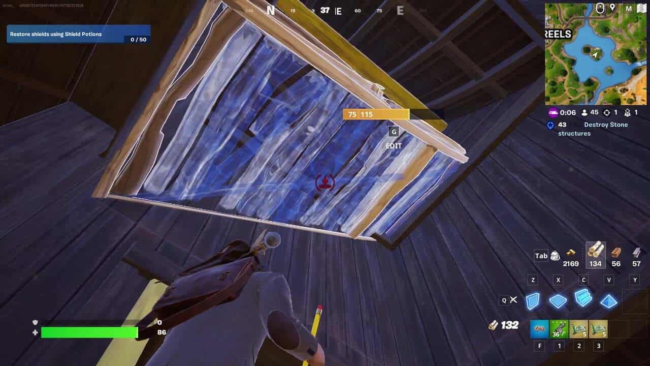 Fortnite best hiding spots: A player building a narrow staircase above them in Fortnite.