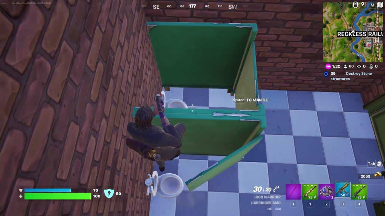 Fortnite best hiding spots: A player standing inside a toilet cubicle in Fortnite.