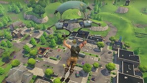 A man is flying over a city in Fortnite Chapter 1.