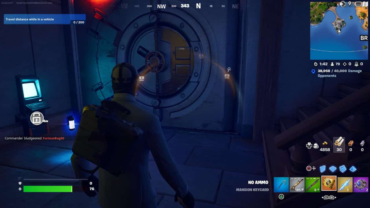 Player in a yellow hazmat suit aiming at a vault door in Fortnite Chapter 5 Season 2 game environment.