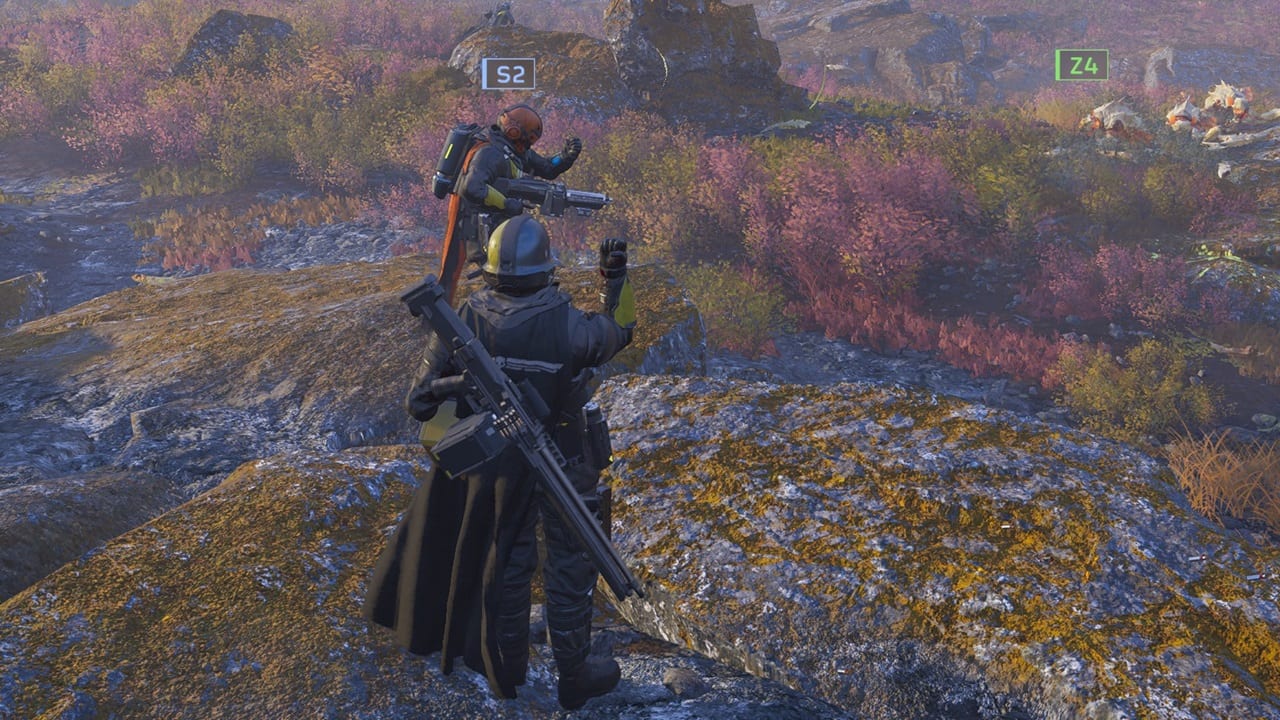 Helldivers 2 emote - An image of two players saluting each other in the game.