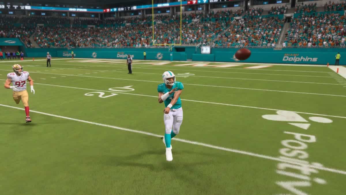 The Miami Dolphins football player is throwing a ball, evading sacks with our guide to evading sacks.