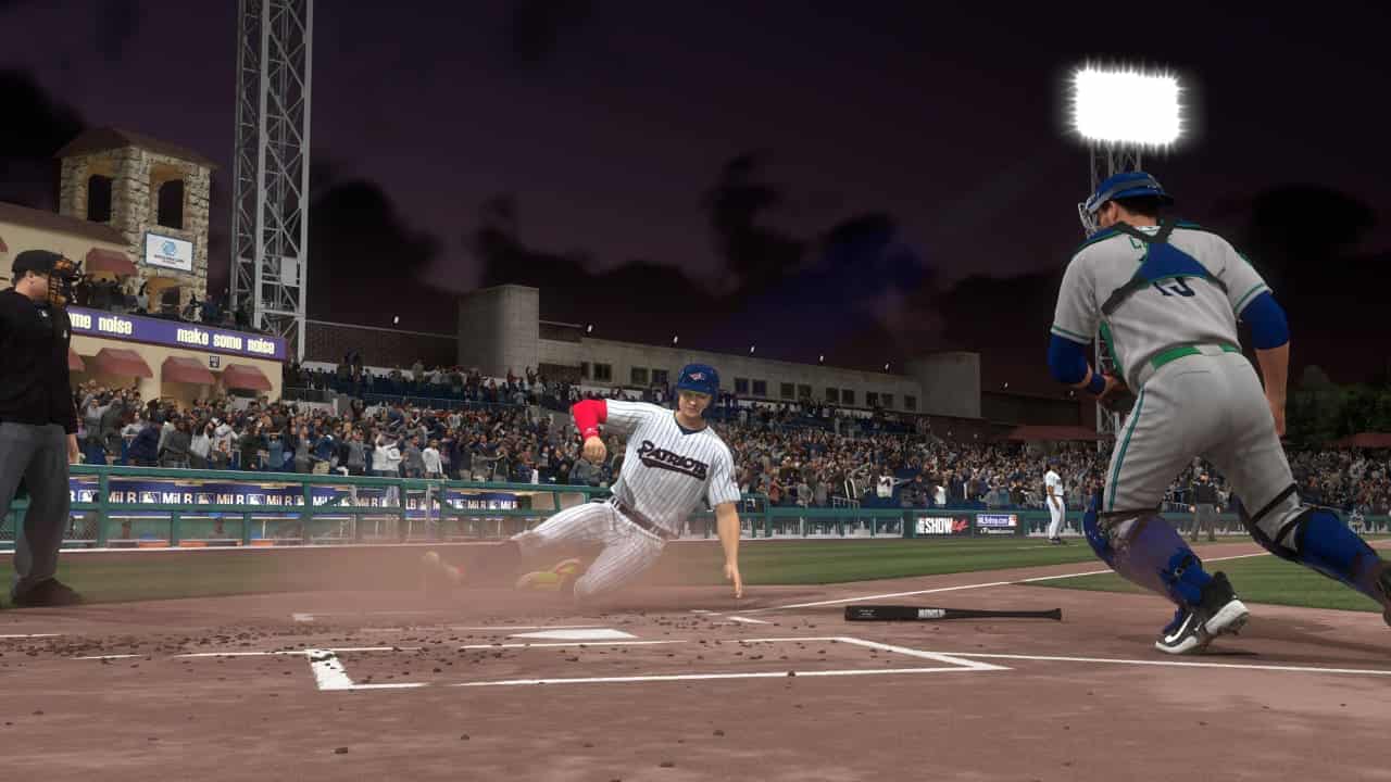 how to upgrade player mlb the show 24: A player slides safely into home