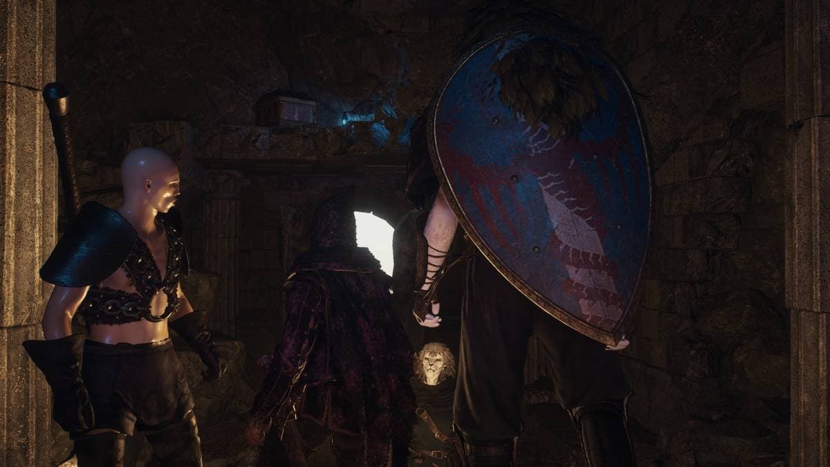 All Dragon's Dogma 2 Sphinx riddle solutions - Three characters from Dragon's Dogma 2 stand at the entrance of a stone doorway, with one holding an oversized shield.
